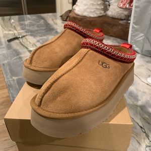 Brand new Ugg platform tasman slipper. New with box, never used, too small.